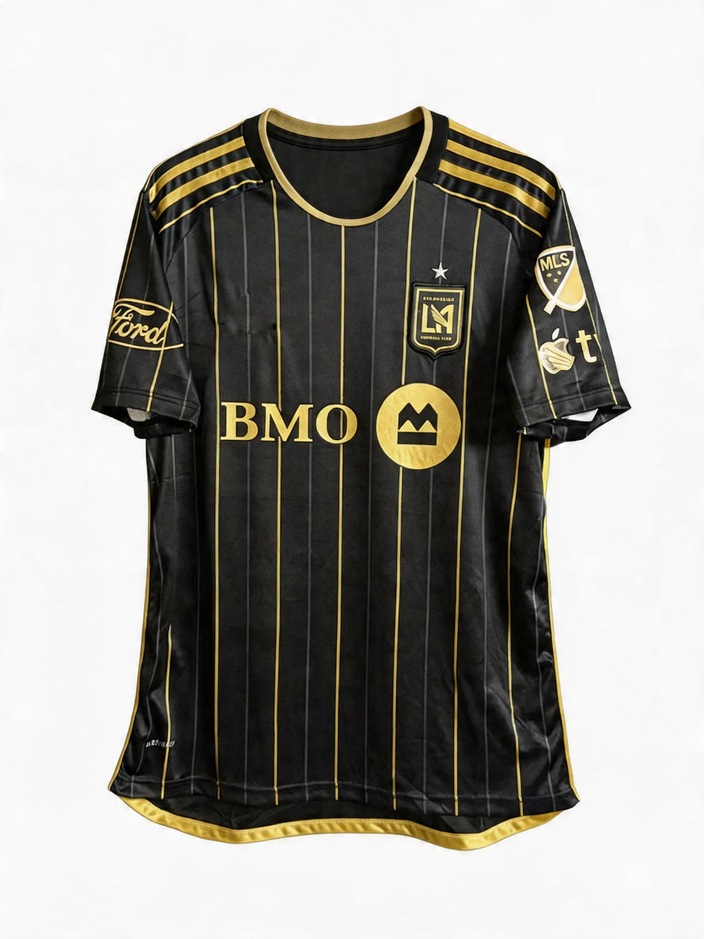 Black sports jersey with gold accents and branding on a white background