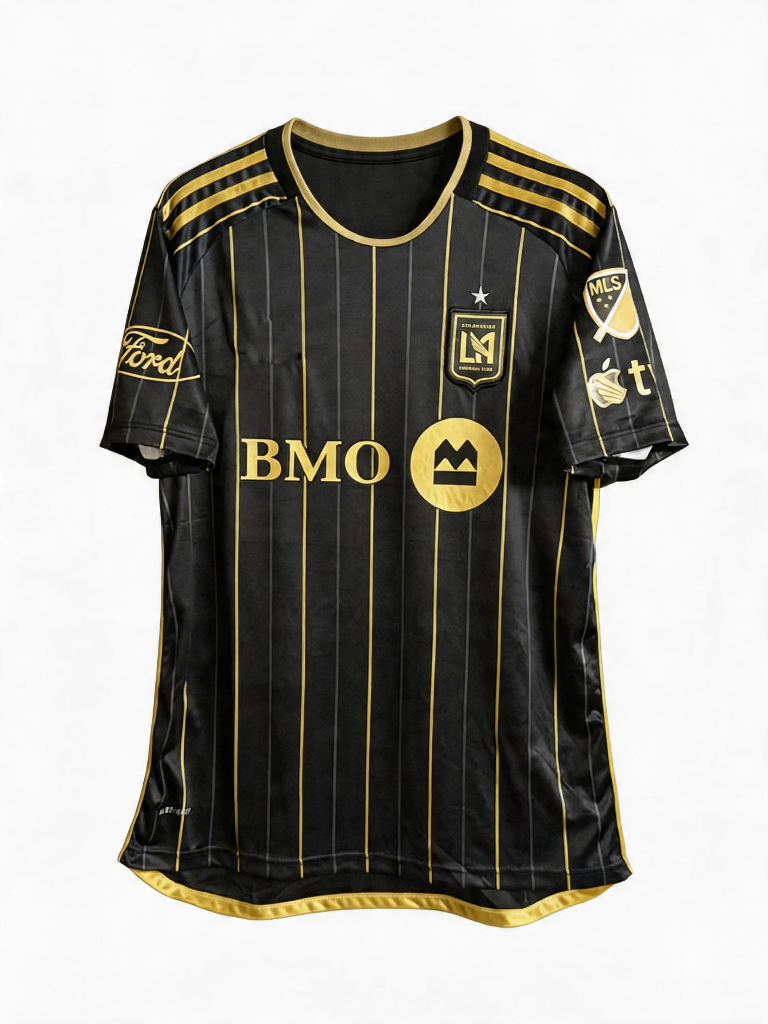 Black sports jersey with gold accents and branding on a white background